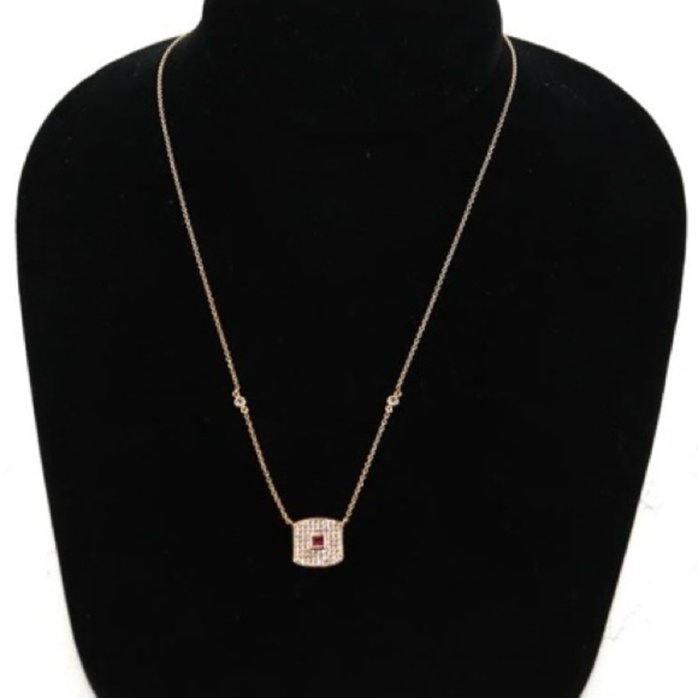Elegant Gold Necklace with Red Gemstone